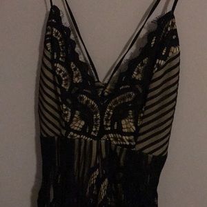 Black and Nude Lacey Romper from ANGL